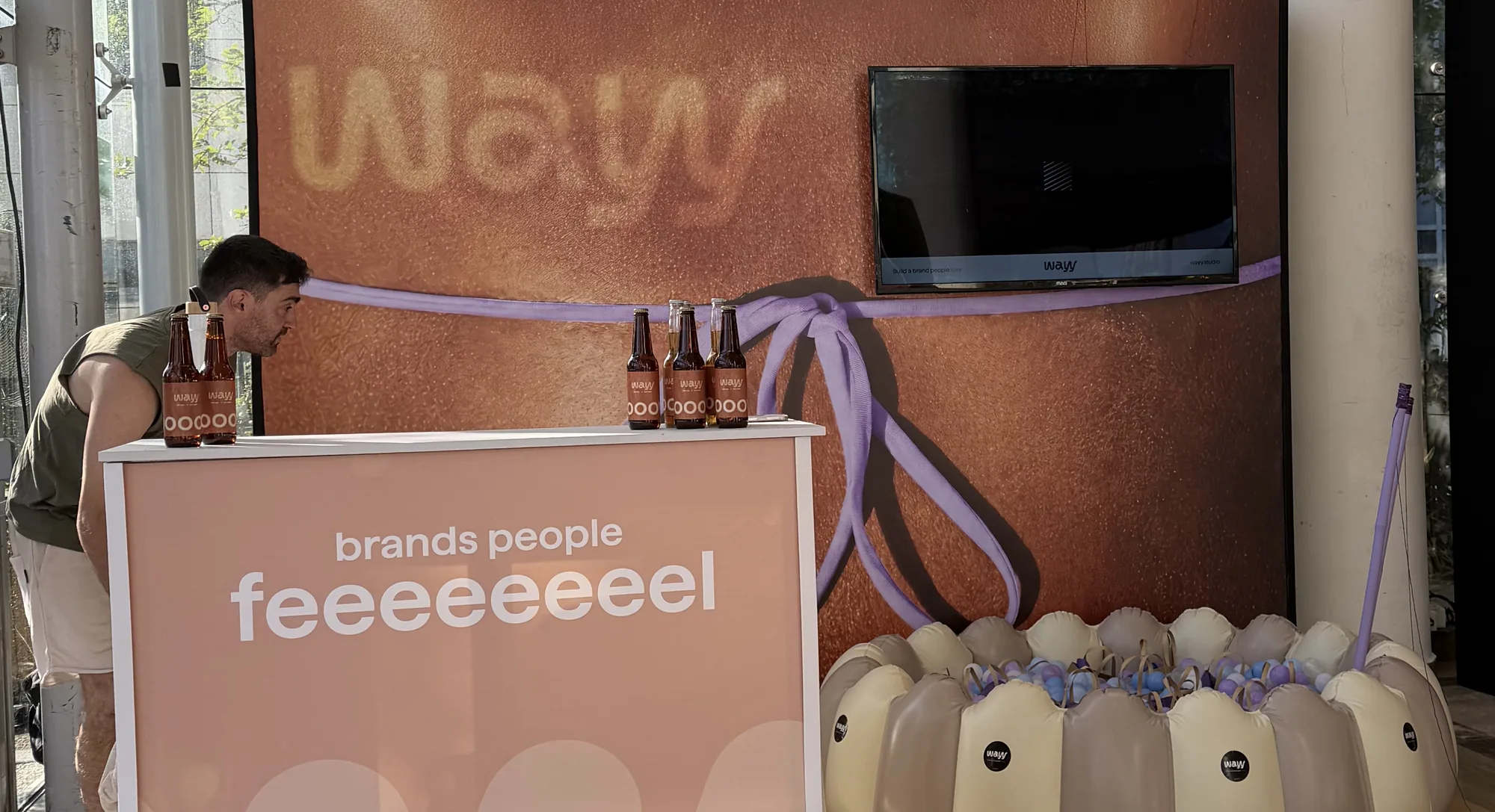 Brands people feeeeeeel sign and ball pit